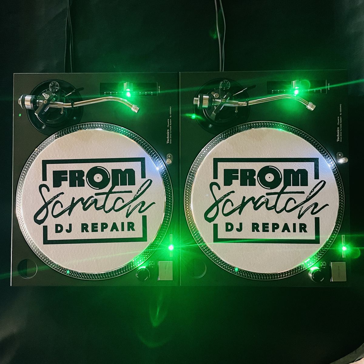 From Scratch DJ Repair branded slipmats with green LED lighting