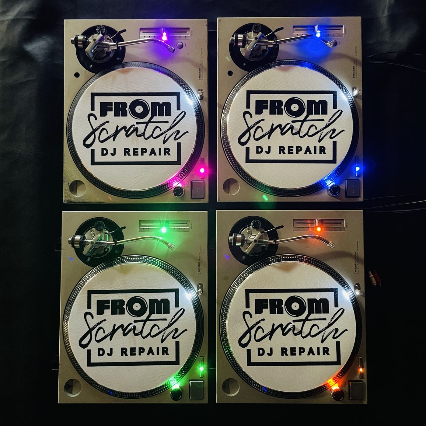 Technics turntables with custom color LED installation and From Scratch DJ Repair slipmats